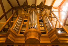 A Large Wooden Church Pipe Organ Is Slowly Assembled In A  Workshop In Tacoma, Washington.