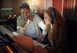 © N Felix/peopleimages.com - Collaboration, teamwork or music recording with sound engineering headphones, laptop or computer in edm studio. Musician, friends or happy people on technology in radio, audio or dj media production