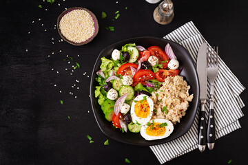 Wall Mural - Healthy breakfast. Greek inspired savory oatmeal with fresh cucumber, tomatoes, olives, lettuce, mozzarella cheese and boiled egg. Top view