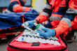 © Halfpoint - Close-up of emergency equipment during rescue action.