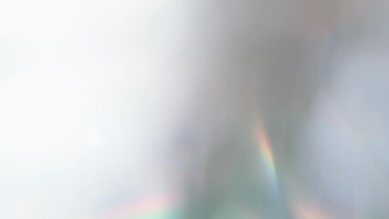Wall Mural - Pearlescent Glare and Flicker. Loop. The light passes through the facets of a slowly rotating diamond and creates repetitive sparkling highlights and rainbow colors
