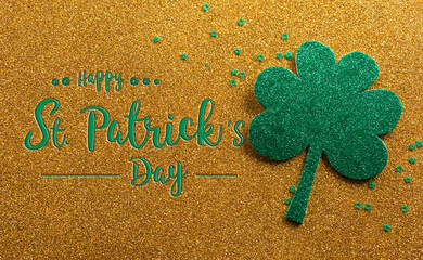 Wall Mural - Happy St Patrick's Day decoration concept made from shamrocks ( clover leaf) on golden background.