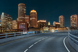 Fototapeta  - Empty urban asphalt road exterior with city buildings background. New modern highway concrete construction. Concept of way to success. Transportation logistic industry fast delivery. Boston. USA.