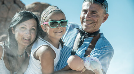 Wall Mural - Family of three people happy visiting US National Park in summertime