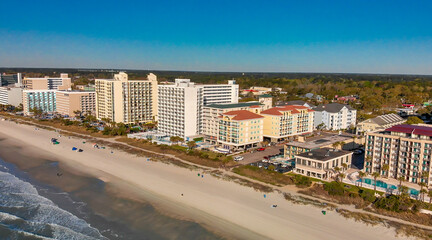 Wall Mural - Aerial view of Myrtle Beach, South Carolina. Buildings and beach at sunset