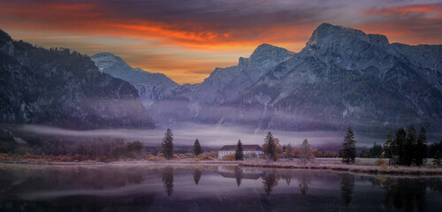 Aufkleber - Amazing nature landscape. Foggy lake at sunrise in autumn during sunset. Almsee lake in the austrian apls. concept of an ideal resting place. Creative image. Austria.