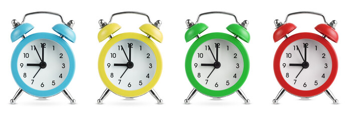 Wall Mural - Set of coloured alarm clocks isolated