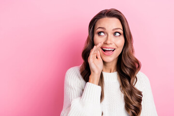 Sticker - Portrait of positive cheerful lady hand near mouth look empty space say tell news isolated on pink color background