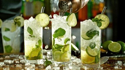 Poster - Preparation of mojito drinks on bar counter.