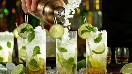 Poster - Preparation of mojito drinks on bar counter.
