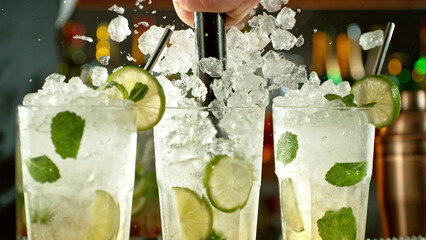 Poster - Preparation of mojito drinks on bar counter.
