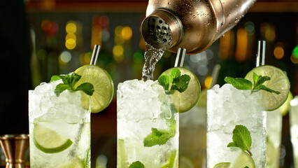 Poster - Preparation of mojito drinks on bar counter.