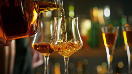 Wall Mural - Detail of pouring rum into glass.