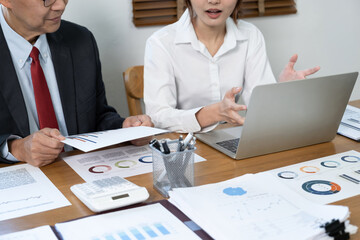 Wall Mural - Administrator business man financial inspector and secretary making report calculating balance. Internal Revenue Service checking document.