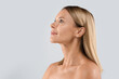 © Prostock-studio - Closeup of beautiful blonde woman looking at copy space
