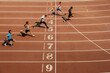 men runners sprint race finish motion blur
