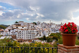 Fototapeta Uliczki - Panoramic photograph of Frigiliana, Málaga, one of the most beautiful towns in Spain. With its white  walls, its narrow streets and a lot of stairs.