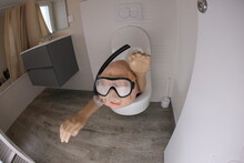 Man Snorkeling In The Toilet 