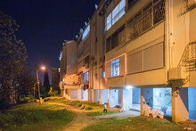 Night Scene With Small Boy ( Motion Blurred) Next To Residential Building (3-stage) In Haifa