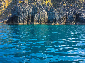 Wall Mural - Gökçeada Volcanic rock formations along the sea strip in Gökçeada. Local people call these rock forms Cheese cliffs. Canakkale Turkey