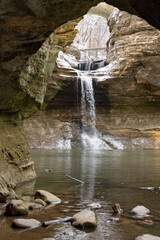 Snow falling on a winter hike in the Lower Dells area of Matthiessen State Park.  Oglesby, Illinois, USA.