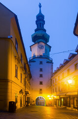 Wall Mural - Image of centre of Bratislava with Michael's Gate illuminated at dusk, Slovakia..