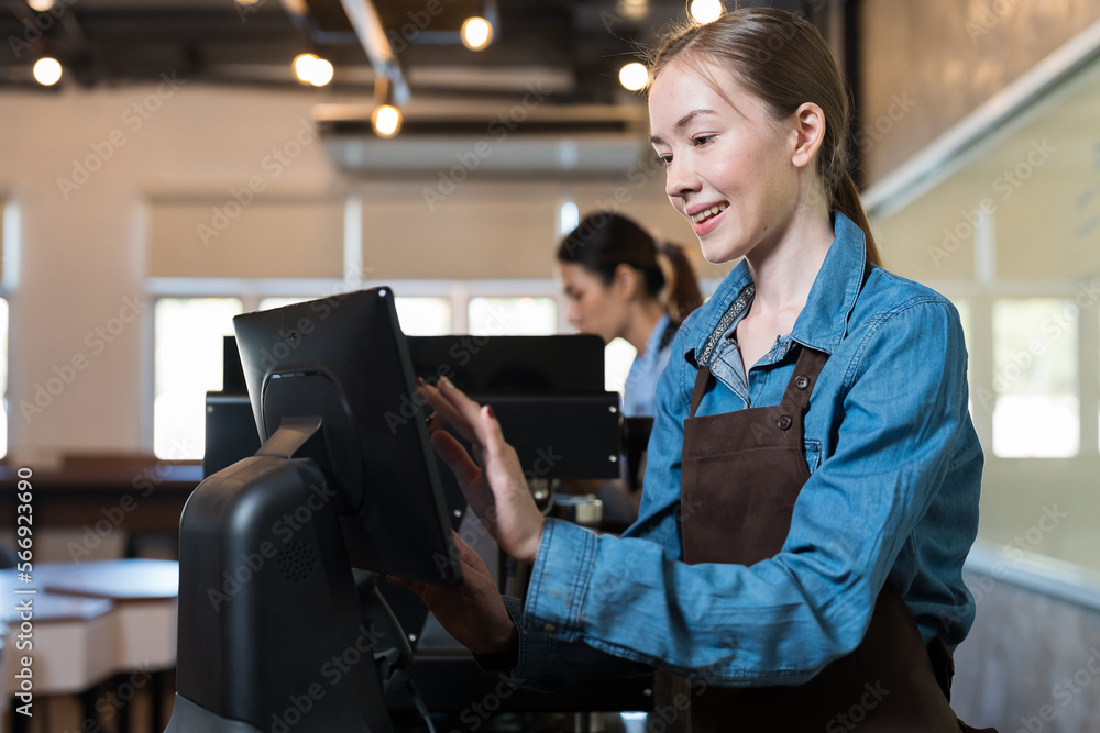 Photo Stock Smiling woman barista take order from customer in coffee ...