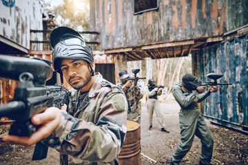 Poster - Paintball, teamwork and soldier group together for military, army and field game training. Exercise, fitness and target shooting of a man with battlefield players in a sports event outdoor with focus