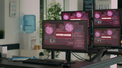 Computers displaying hacking attack alert and security breach in empty it development office. Showing critical error message flashing on screen after system crash, threat warning.
