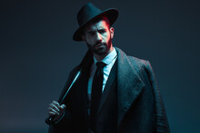 Fashion, Criminal And Face Of Man With Bat For Vintage, Retro And Victorian Gangster On Dark Background. Crime Aesthetic, Thinking And Male Model With Luxury, Designer Suit And Threatening Attitude