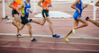 © sports photos - group runners athletes on middle distance run stadium
