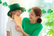 © famveldman - Mother and child on St Patricks day