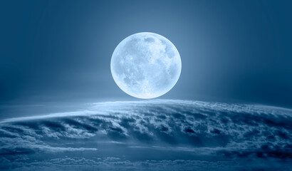 Wall Mural - night sky with full bright moon in the clouds 