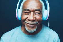 Cool Old Black Man Wearing Headphones Listening Music. Grandpa Listens To Music