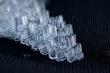 Fototapeta Abstrakcje - Marco Frost Snowflake on Black Background