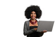 © Edson Souza - woman holding laptop computer typing on keyboard looking at camera, afro woman
