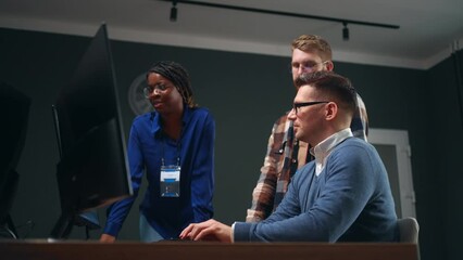 creative group of web developer in international IT-company, black and caucasian men and woman