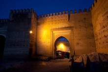 Workers Enter The Old City Of Fez Through One Its Old Gates In Morocco.