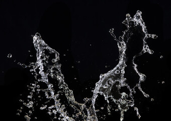 Sticker - Water splash isolated on black background