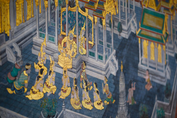 Wall Mural - Temples and tourists at Bangkok's Grand Palace. The Grand Palace is made up of various buildings, halls and pavilions.