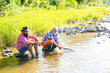 © Volodymyr - Portrait of cheerful senior man fishing. Grandfather and son fishermans. Young man and an old man fishing for spinnings on the river or lake.