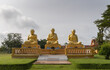 Phuket. Thailand. November 15 2022. Three traditional giant statues of old Buddhist monks in meditation postures