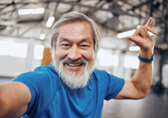 Canvas Print - Fitness, selfie and portrait of Asian man in gym with hand sign for motivation, wellness and cardio workout. Smile, healthy body and face of senior male after training, exercise and sports goals