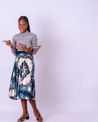 student woman with books and notebooks in hands