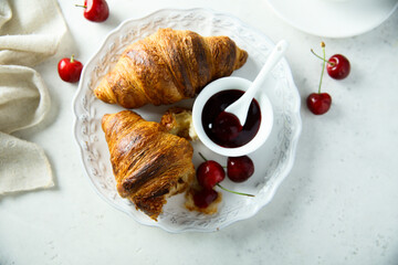 Canvas Print - Freshly made croissants with berries