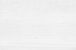 © JAYANNPO - White wooden table close-up surface texture. Light grey wood grain background