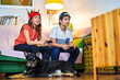 © Cavan Images - Children playing video games together in living room