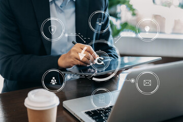 Wall Mural - Copyright or patent concept, Person hand using laptop computer, tablet and smartphone with virtual screen copyright icon trademark, Creation ownership against piracy. at office..
