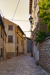 Wall Mural - An old atmospheric city with narrow and cramped quiet streets and stairs