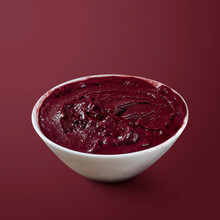 Frozen Acai Berry. Isolated On Purple Background